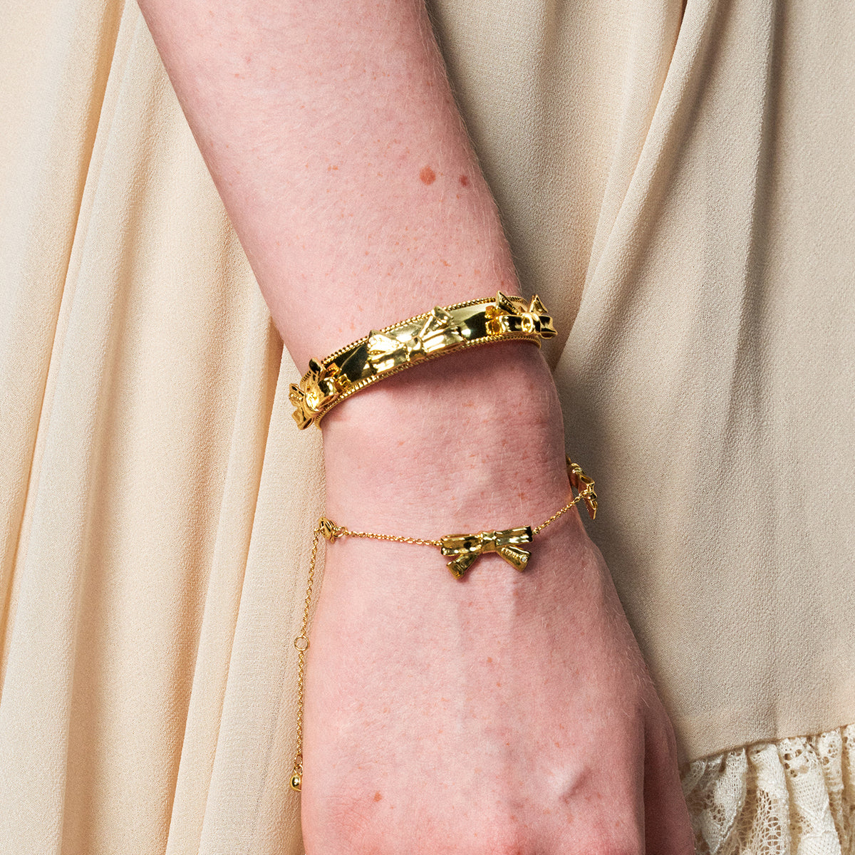 retro trio power bow bangle